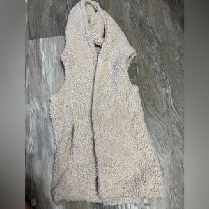 Soft vest with a hood